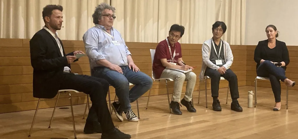 Prof. Dr. Jusufi moderating a panel discussion on Soft Robotics and AI